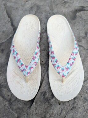 CROCS Women’s White Flip Flop Sandals with Printed Flamingo Straps Size 8